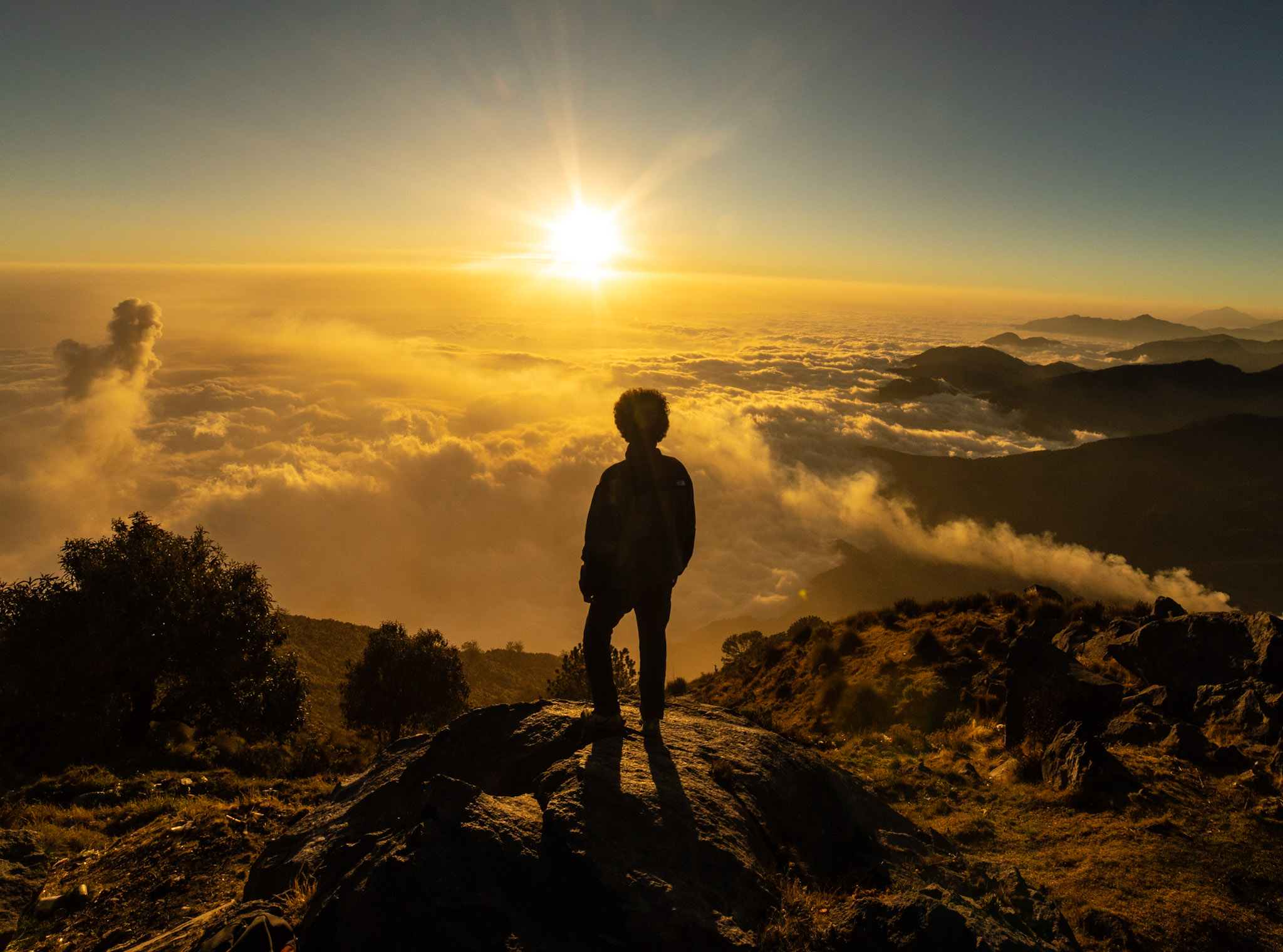 A client on a private sunset tour to the summit of Santa María.